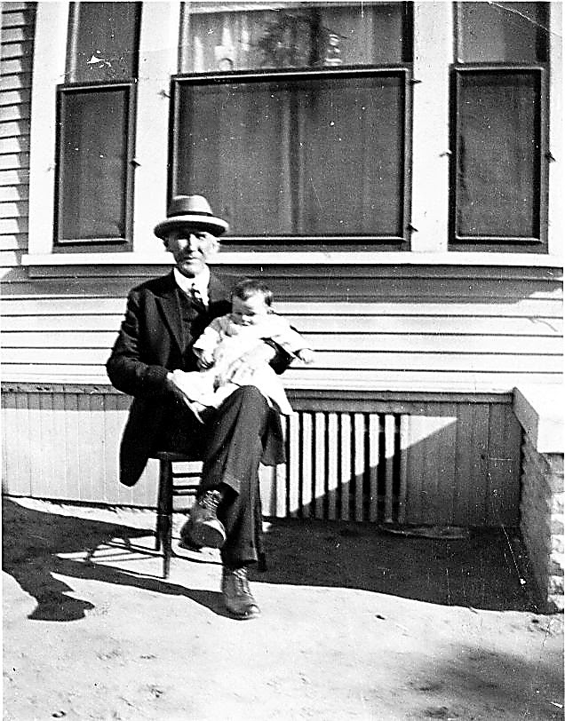 Nels Bandy as an infant, held by his grandfather John Bandy, outside a house in Long Beach, California, circa 1923.