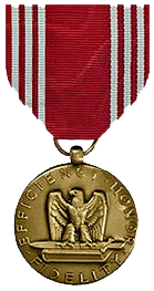 The Army Good Conduct Medal: a bronze eagle medallion on a red ribbon with narrow white stripes.